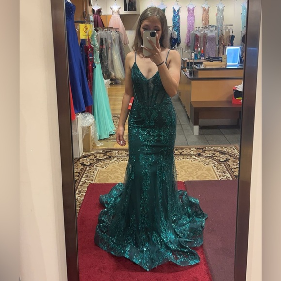 Bottle green tafeta gown embroidered with sequin and beads